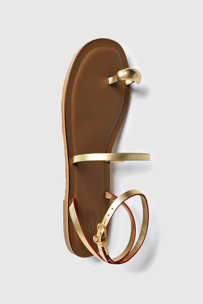 Biarritz Flat Sandal In Gold Metallic Leather
